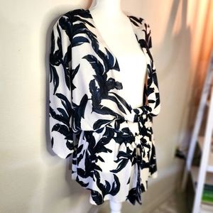 Romper, off white & dark blue, soft gauzey material. 100% Rayon. Size Medium.